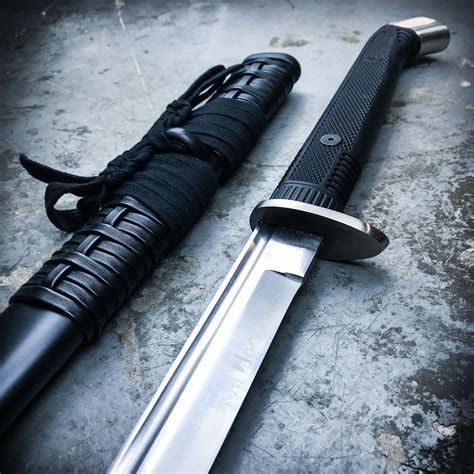 Battle ready katana swords - This sword pays homage to one of our favorite shows. Crafted with precision and attention to detail, this deluxe replica stands out with its reverse blade, with the cutting edge skillfully positioned on the spine of the katana rather than the traditional side of the blade. The sword is made of 1060 Carbon steel, the blade has a length of 40.551.